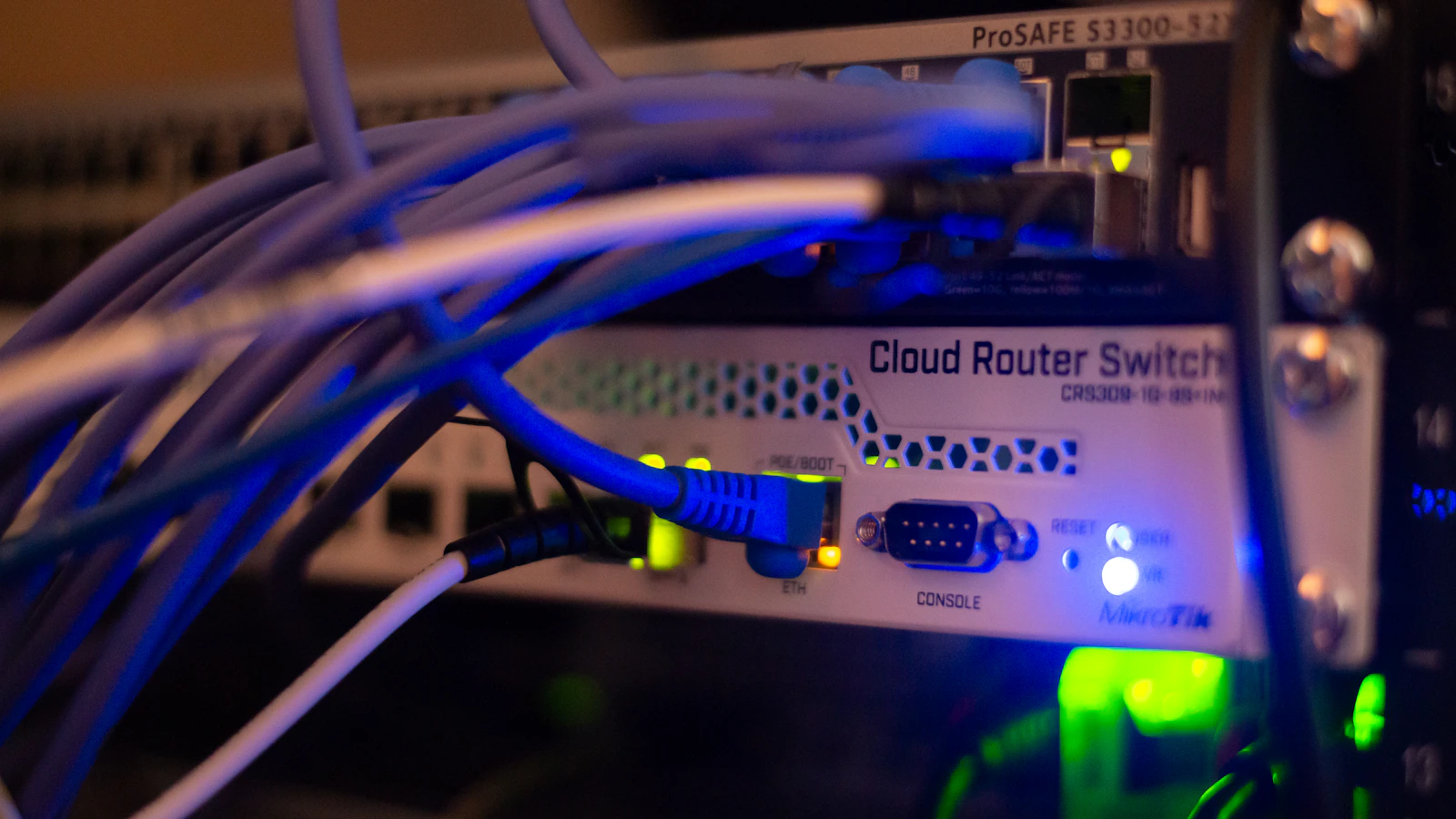 Ethernet cables connected to network switches in an equipment rack